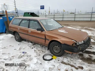 1989 Toyota Camry z VIN JT2SV21W5K0240987, wystawiony jako Copart lot #42248385 z przebiegiem 246 651 mil mil oraz Czysty tytuł • Clean title. Historia ofert i sprzedaży dostępna na DreamBid. Obrazek 4.