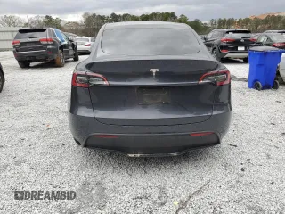 2025 Tesla Model Y Long Range with VIN 7SAYGDED9SA341967, listed as a Copart auction lot 47368695 with 4,310 mi miles and Salvage Title. Bid and sale history available at DreamBid. Image 6.