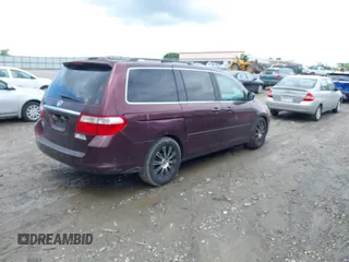 2007 Honda Odyssey Touring with VIN 5FNRL38887B121770, listed as a IAAI auction lot 42253433 with 237,597 mi miles and . Bid and sale history available at DreamBid. Image 4.
