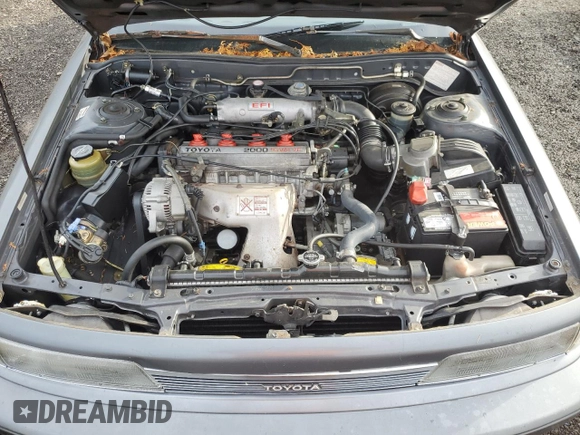 1988 Toyota Camry LE z VIN JT2SV22E0J0237998, wystawiony jako Copart lot #78850584 z przebiegiem 165 880 mil mil oraz Szkoda całkowita • Salvage title. Historia ofert i sprzedaży dostępna na DreamBid. Obrazek 11.