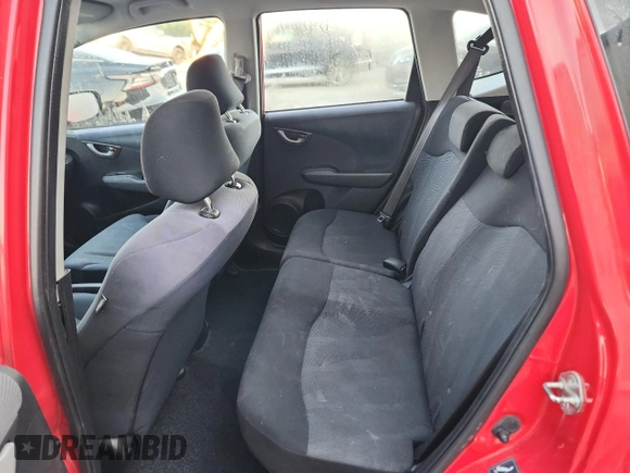 2009 Honda Fit Sport z VIN JHMGE88479S055924, wystawiony jako Copart lot #67186495 z przebiegiem 65 984 mil mil oraz Szkoda całkowita • Salvage title. Historia ofert i sprzedaży dostępna na DreamBid. Obrazek 10.