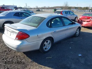 2002 Ford Taurus SEL Deluxe with VIN 1FAFP56S42A214343, listed as a IAAI auction lot 41640709 with 95,616 mi miles. Bid and sale history available at carsss.com. Image 4.