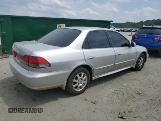 2001 Honda Accord LX z VIN 1HGCG564X1A135855, wystawiony jako Copart lot #57346815 z przebiegiem 235 585 mil mil oraz Szkoda całkowita • Salvage title. Historia ofert i sprzedaży dostępna na DreamBid. Obrazek 3.
