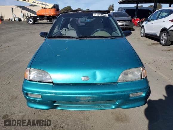 1993 Geo Metro z VIN JG1MR3367PK201491, wystawiony jako Copart lot #41543565 z przebiegiem 61 829 mil mil oraz Tytuł czysty. Historia ofert i sprzedaży dostępna na DreamBid. Obrazek 5.