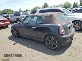 2013 MINI Convertible S with VIN WMWZP3C51DT551373, listed as a Copart auction lot 57878745 with 110,181 mi miles and Salvage title. Bid and sale history available at DreamBid. Image 2.