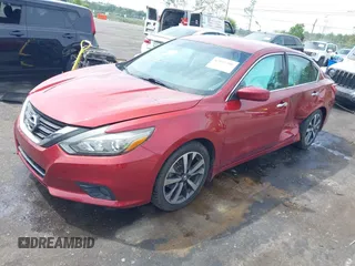 2016 Nissan Altima SL with VIN 1N4AL3AP1GC264898, listed as a IAAI auction lot 42093306 with 115,429 mi miles and . Bid and sale history available at carsss.com. Image 2.