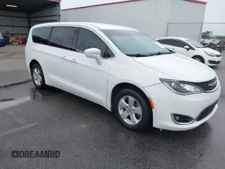 2020 Chrysler Pacifica Touring with VIN 2C4RC1FG4LR135808, listed as a IAAI auction lot 41932205 with 152,073 mi miles and . Bid and sale history available at DreamBid. Image 1.