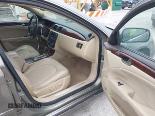 2011 Buick Lucerne CXL Premium with VIN 1G4HJ5EM0BU104715, listed as a IAAI auction lot 41706751 with 123,636 mi miles. Bid and sale history available at carsss.com. Image 5.