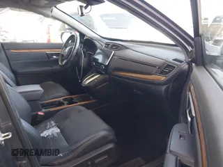 2020 Honda CR-V Touring z VIN 7FART6H91LE000684, wystawiony jako IAAI lot #42504731 z przebiegiem 49 100 mil mil oraz . Historia ofert i sprzedaży dostępna na DreamBid. Obrazek 5.