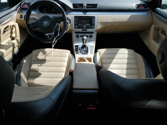 2014 Volkswagen CC Sport with VIN WVWBP7AN8EE538737, listed as a Copart auction lot 68656344 with 131,941 mi miles and Salvage Title. Bid and sale history available at carsss.com. Image 8.