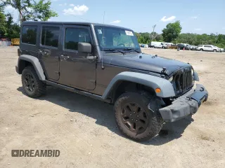 2014 Jeep Wrangler Unlimited Sport with VIN 1C4BJWDG1EL298161, listed as a Copart auction lot 61996735 with 176,043 mi miles and Salvage title. Bid and sale history available at DreamBid. Image 4.