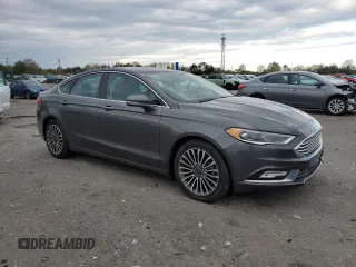 2017 Ford Fusion SE with VIN 3FA6P0H98HR120168, listed as a Copart auction lot 51760235 with 124,791 mi miles and Salvage Title. Bid and sale history available at DreamBid. Image 4.