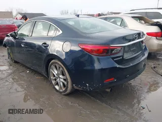 2016 Mazda Mazda6 i Touring with VIN JM1GJ1T54G1434497, listed as a IAAI auction lot 41654012 with 133,901 mi miles. Bid and sale history available at carsss.com. Image 3.