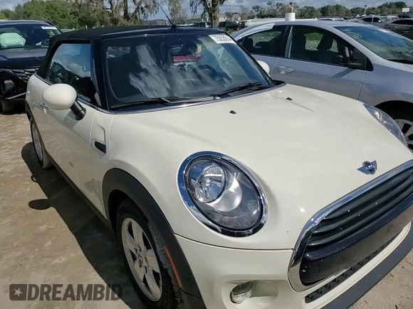 2017 MINI Convertible Cooper z VIN WMWWG5C38H3C99627, wystawiony jako Copart lot #75053914 z przebiegiem 42 087 mil mil oraz Nie do naprawy • Non repairable. Historia ofert i sprzedaży dostępna na DreamBid. Obrazek 14.