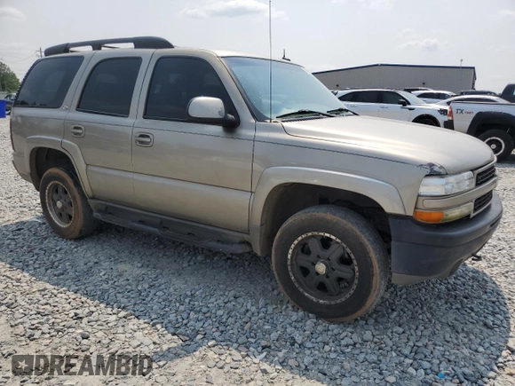 2002 Chevrolet Tahoe Z71 z VIN 1GNEK13Z02R269752, wystawiony jako Copart lot #59030705 z przebiegiem 342 433 mil mil oraz Szkoda całkowita • Salvage title. Historia ofert i sprzedaży dostępna na DreamBid. Obrazek 4.