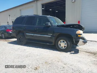 2003 GMC Yukon SLT z VIN 1GKEC13Z63J311867, wystawiony jako IAAI lot #41902929 z przebiegiem 300 768 mil mil oraz . Historia ofert i sprzedaży dostępna na DreamBid. Obrazek 1.