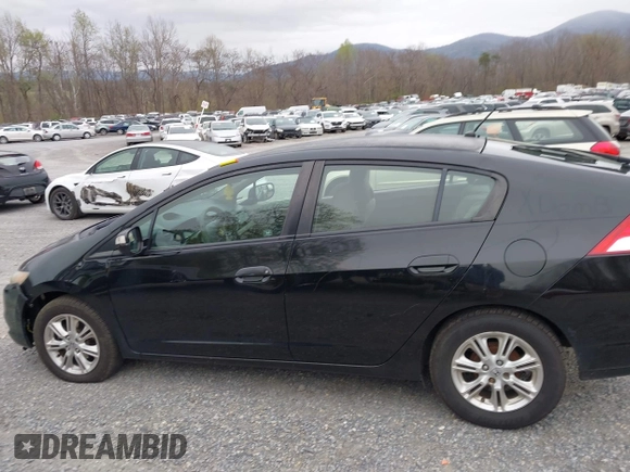 2010 Honda Insight EX with VIN JHMZE2H73AS002299, listed as a IAAI auction lot 41900761 with 251,934 mi miles and . Bid and sale history available at DreamBid. Image 14.