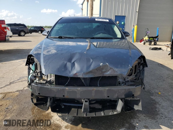 2009 Chevrolet Impala LS with VIN 2G1WB57K191151058, listed as a Copart auction lot 54712315 with 128,307 mi miles and Salvage Title. Bid and sale history available at DreamBid. Image 5.