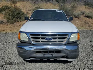 2004 Ford F-150 XL with VIN 2FTRF18W54CA36334, listed as a Copart auction lot 63464375 with 253,805 mi miles and Salvage title. Bid and sale history available at DreamBid. Image 5.