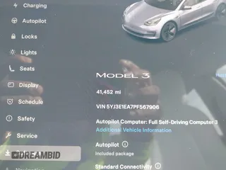 2023 Tesla Model 3 with VIN 5YJ3E1EA7PF567906, listed as a IAAI auction lot 42280993 with 41,452 mi miles and . Bid and sale history available at DreamBid. Image 16.