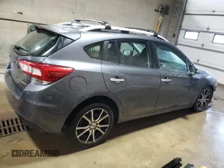 2018 Subaru Impreza Limited z VIN 4S3GTAU60J3703821, wystawiony jako Copart lot #59809195 z przebiegiem 125 912 mil mil oraz Szkoda całkowita • Salvage title. Historia ofert i sprzedaży dostępna na DreamBid. Obrazek 3.