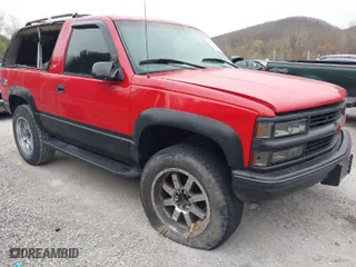 1996 Chevrolet Tahoe with VIN 3GNEK18R8TG153872, listed as a IAAI auction lot 41913476 with 120,686 mi miles. Bid and sale history available at carsss.com. Image 1.