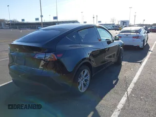 2023 Tesla Model Y Long Range with VIN 7SAYGAEE3PF925928, listed as a IAAI auction lot 41753910 with Not provided miles and . Bid and sale history available at DreamBid. Image 4.