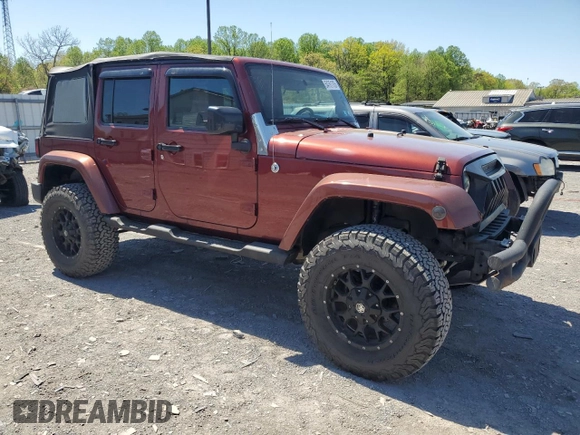 2010 Jeep Wrangler Unlimited Sahara with VIN 1J4BA5H11AL107228, listed as a Copart auction lot 54761705 with 102,816 mi miles and Clean Title. Bid and sale history available at carsss.com. Image 4.