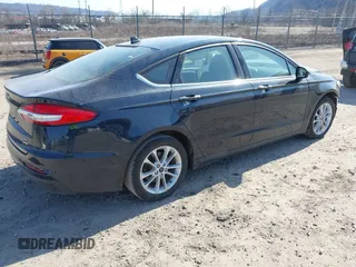 2020 Ford Fusion SE with VIN 3FA6P0LU4LR262988, listed as a IAAI auction lot 41768189 with 64,086 mi miles and . Bid and sale history available at DreamBid. Image 4.