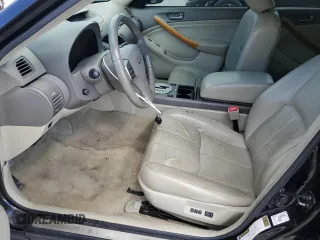 2004 Infiniti G35 w/Leather with VIN JNKCV51F54M711902, listed as a Copart auction lot 70869704 with 151,520 mi miles and Salvage Title. Bid and sale history available at DreamBid. Image 7.