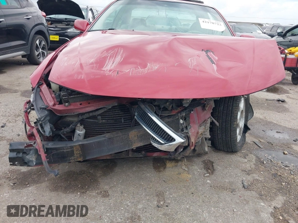 2000 Toyota Solara SE z VIN 2T1CF22P6YC324296, wystawiony jako IAAI lot #42178723 z przebiegiem Nie podano mil oraz . Historia ofert i sprzedaży dostępna na DreamBid. Obrazek 11.