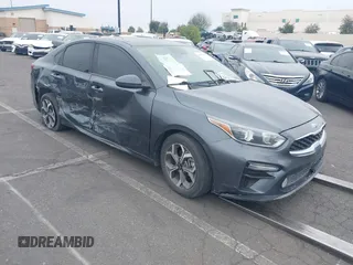 2019 Kia Forte LXS z VIN 3KPF24AD3KE076142, wystawiony jako IAAI lot #41403408 z przebiegiem 138 537 mil mil oraz . Historia ofert i sprzedaży dostępna na DreamBid. Obrazek 1.