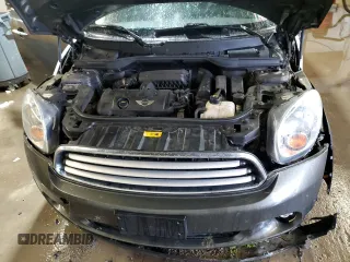 2014 MINI Countryman with VIN WMWZB3C59EWR42124, listed as a Copart auction lot 57830395 with 125,000 mi miles and Salvage title. Bid and sale history available at DreamBid. Image 12.