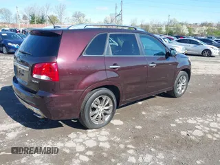 2011 Kia Sorento SX with VIN 5XYKW4A27BG163580, listed as a IAAI auction lot 41987362 with 172,097 mi miles. Bid and sale history available at carsss.com. Image 4.