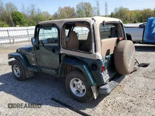 2001 Jeep Wrangler Sahara with VIN 1J4FA59S51P300953, listed as a Copart auction lot 51452505 with 157,642 mi miles and Clean Title. Bid and sale history available at carsss.com. Image 2.