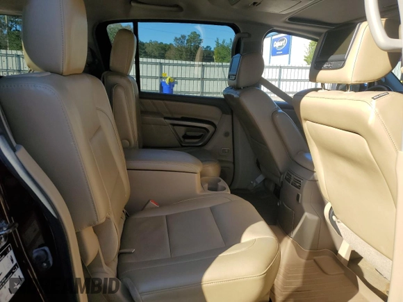 2015 Nissan Armada Platinum z VIN 5N1BA0NF2FN602165, wystawiony jako Copart lot #81283414 z przebiegiem Nie podano mil oraz Szkoda całkowita • Salvage title. Historia ofert i sprzedaży dostępna na DreamBid. Obrazek 11.