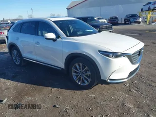 2023 Mazda CX-9 Grand Touring with VIN JM3TCBDY4P0633456, listed as a IAAI auction lot 41510127 with 24,706 mi miles and . Bid and sale history available at carsss.com. Image 1.