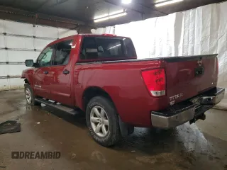 2014 Nissan Titan Pro-4X z VIN 1N6AA0EC6EN501437, wystawiony jako Copart lot #82822234 z przebiegiem 131 112 mil mil oraz Szkoda całkowita • Salvage title. Historia ofert i sprzedaży dostępna na DreamBid. Obrazek 2.