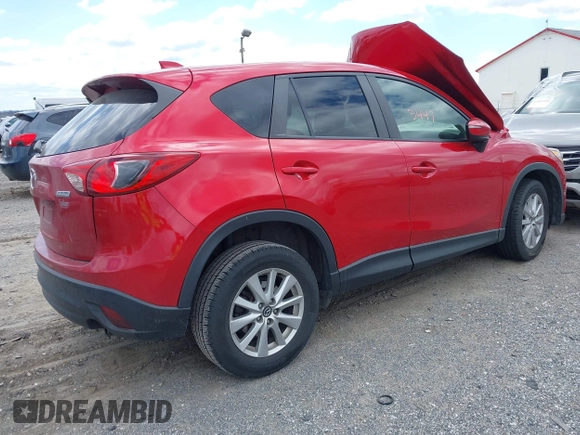 2015 Mazda CX-5 Touring with VIN JM3KE4CY7F0492559, listed as a IAAI auction lot 42053447 with 95,675 mi miles. Bid and sale history available at carsss.com. Image 4.