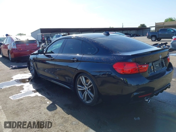 2015 BMW 4 Series 435i with VIN WBA4B1C54FD418309, listed as a IAAI auction lot 42099401 with 119,982 mi miles and . Bid and sale history available at carsss.com. Image 3.