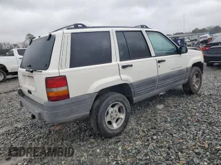 1997 Jeep Grand Cherokee TSi with VIN 1J4FX58S0VC578818, listed as a Copart auction lot 48463795 with 133,200 mi miles and Salvage Title. Bid and sale history available at carsss.com. Image 3.