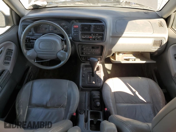 2002 Chevrolet Tracker ZR2 with VIN 2CNBJ734X26948098, listed as a Copart auction lot 73135754 with 234,627 mi miles and Salvage title. Bid and sale history available at DreamBid. Image 8.