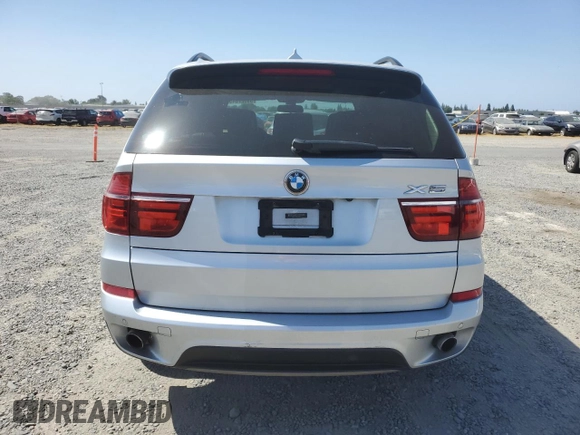 2012 BMW X5 35i with VIN 5UXZV4C5XCL751020, listed as a Copart auction lot 59327845 with 106,249 mi miles and Salvage title. Bid and sale history available at DreamBid. Image 6.