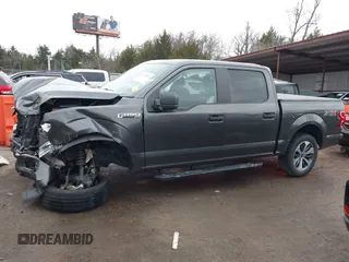 2019 Ford F-150 XL with VIN 1FTEW1C53KKD70870, listed as a IAAI auction lot 41208988 with 31,728 mi miles and . Bid and sale history available at carsss.com. Image 14.