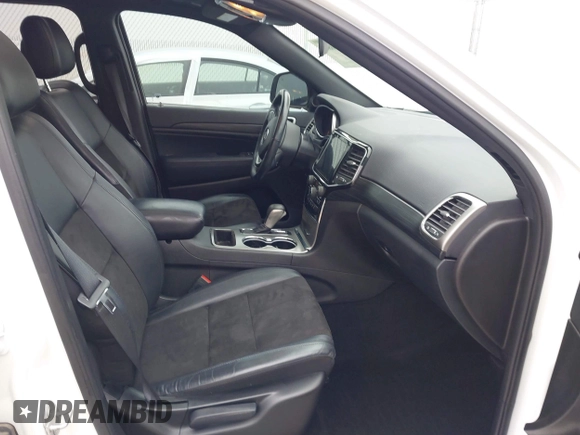2021 Jeep Grand Cherokee Laredo E with VIN 1C4RJEAG7MC713026, listed as a IAAI auction lot 42010894 with 37,336 mi miles and . Bid and sale history available at DreamBid. Image 5.