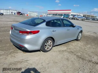 2018 Kia Optima LX with VIN 5XXGT4L3XJG201472, listed as a IAAI auction lot 41394624 with 84,950 mi miles. Bid and sale history available at carsss.com. Image 4.