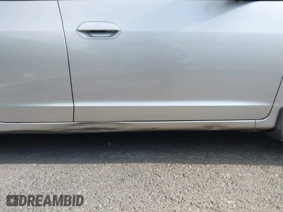 2010 Honda Insight EX with VIN JHMZE2H75AS003695, listed as a IAAI auction lot 42119429 with 90,901 mi miles and . Bid and sale history available at DreamBid. Image 17.