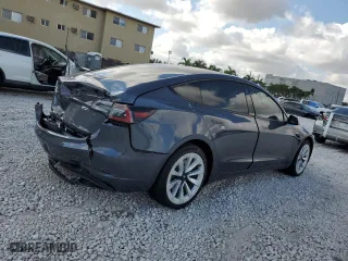 2023 Tesla Model 3 with VIN 5YJ3E1EA8PF552850, listed as a Copart auction lot 43792015 with 0 mi miles and Salvage Title. Bid and sale history available at carsss.com. Image 3.