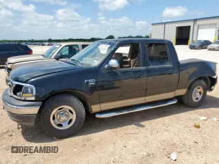 2001 Ford F-150 XLT with VIN 1FTRW07L11KA53494, listed as a Copart auction lot 61101485 with Not provided miles and Salvage title. Bid and sale history available at DreamBid. Image 1.