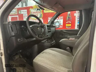 2014 Chevrolet Express Cargo z VIN 1GCWGFCA7E1198607, wystawiony jako IAAI lot #42480161 z przebiegiem 210 462 mil mil oraz . Historia ofert i sprzedaży dostępna na DreamBid. Obrazek 19.